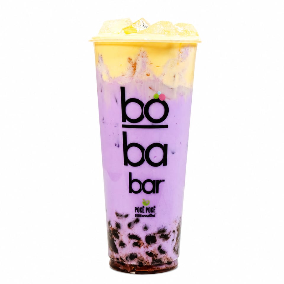 A Boba Bar taro milk tea with dark boba pearls and a yellow cheese foam topping.