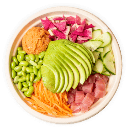 Poke bowl containing seafood and various, vibrant vegetables.