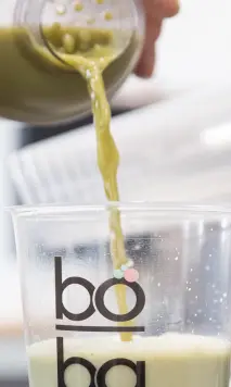 Boba being poured into cup